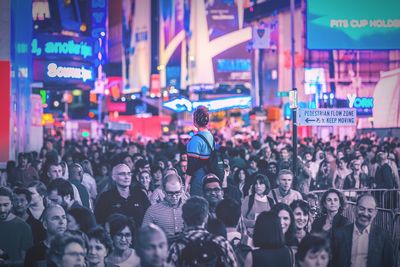 Crowd in city at night