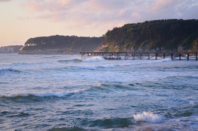 Scenic view of sea against sky during sunset