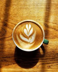 Directly above shot of cappuccino on table