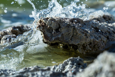 Close-up of rocks in water