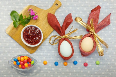 High angle view of multi colored candies on table