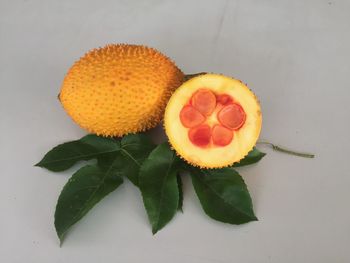 Close-up of orange fruit on table