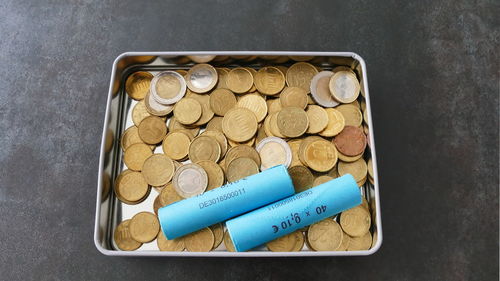 High angle view of coins on table