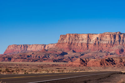 Landscape of road and multi-colored vermillion cliffs national monument in arizona