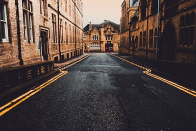 Road in city against sky