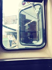 Reflection of train on window