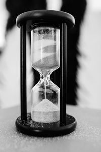 Close-up of clock on table