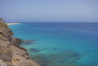 Scenic view of sea against clear sky