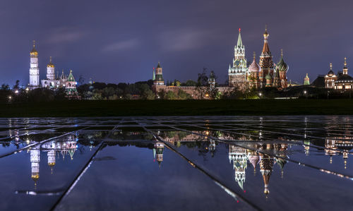 Reflection of st basil cathedral at moscow kremlin in city during night