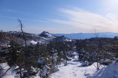 Scenic view of snow covered mountains