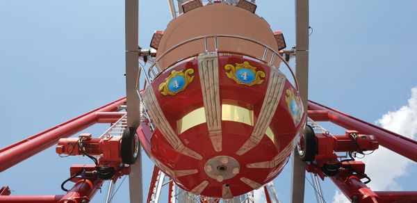 Low angle view of ferris wheel against clear sky