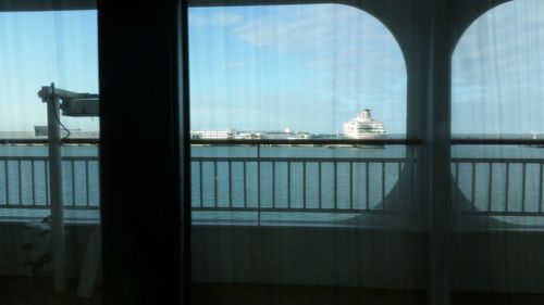 Scenic view of sea against sky seen through boat