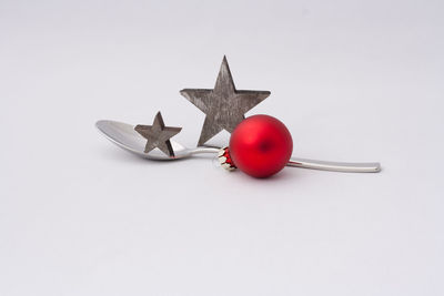 High angle view of tomatoes against white background