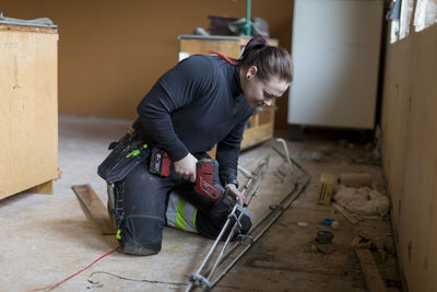 Woman renovating house