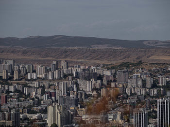 Cityscape of tbilisi with hills in the background