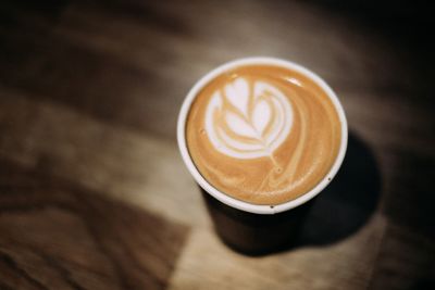 High angle view of cappuccino on table