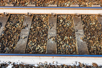 High angle view of pigeons on railroad track