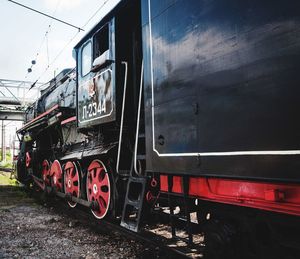 Train on railroad track against sky