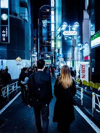 People walking on city street