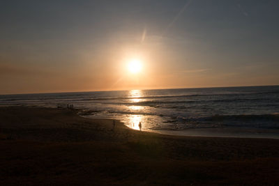 Scenic view of beach during sunset