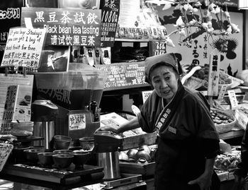 Portrait of smiling man at market