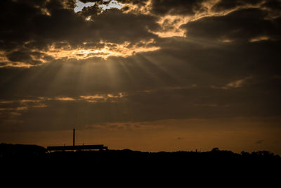 Low angle view of dramatic sky during sunset