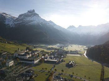 Scenic view of landscape and mountains against sky