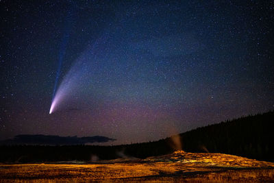 Scenic view of star field against sky at night