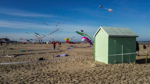 View of beach against blue sky