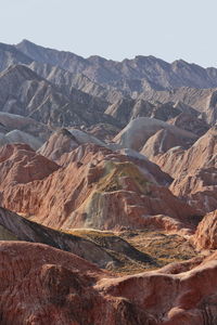 Aerial view of landscape with mountain range in background