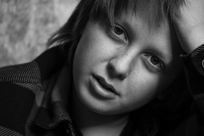 Close-up of young woman looking away