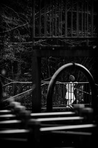 Close-up of footbridge in forest