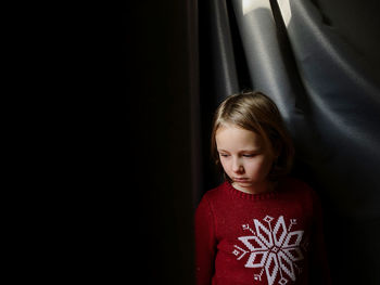 Portrait of cute girl looking away