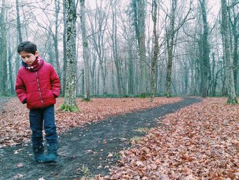 Full length of man standing in park during winter