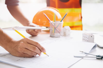 Close-up of man working on table