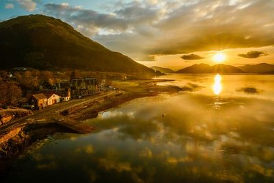 Scenic view of mountains against sky during sunset