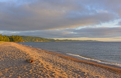 Evening shadows on a gravel beach on agawa bay in lake superior provincial park in ontario