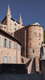 Low angle view of historic building against clear sky
