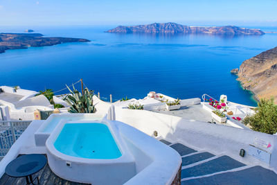 High angle view of swimming pool by sea against sky