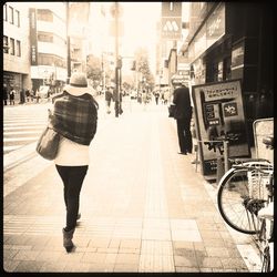 People walking on city street