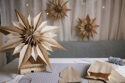 Close-up of paper flower on table