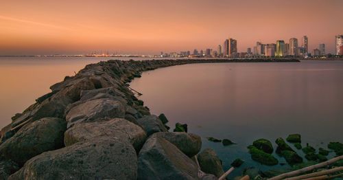 Scenic view of sea against sky during sunset