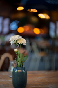 Close-up of flower vase on table