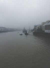 Boats in sea against sky