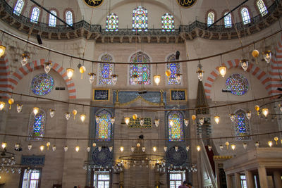 Low angle view of illuminated ceiling of building