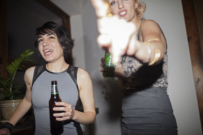 Young people celebrating at a party