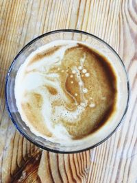 High angle view of cappuccino on table