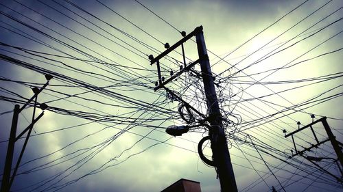 Low angle view of electricity pylon