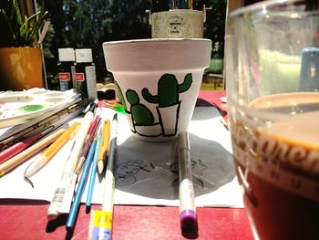 Close-up of paintbrushes on table