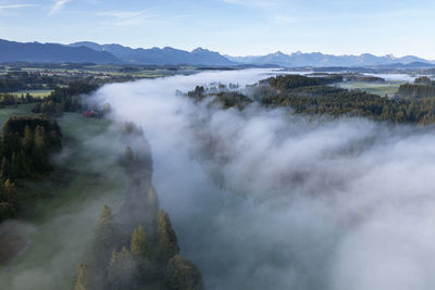 Germany, bavaria, aerial view of thick fog over river lech in autumn